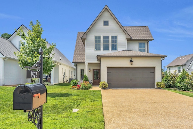 1572 John Galt Dr, Lebanon, TN 37087 - traditional-style house featuring an attached garage, driveway, a front lawn, and a shingled roof