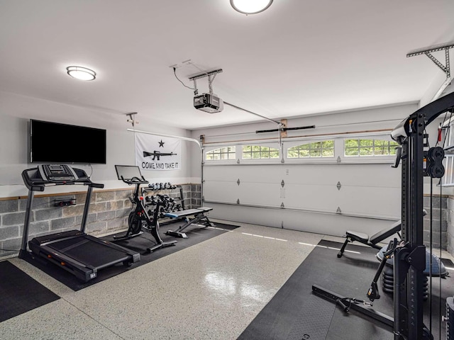 exercise room with a garage
