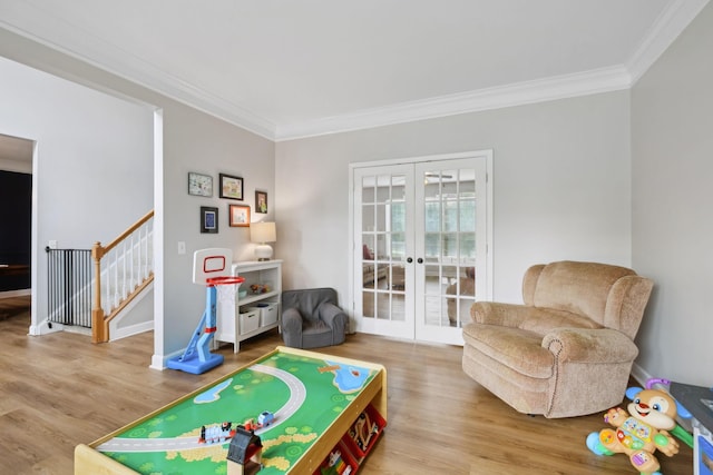 104 Drayton Ct, Franklin, TN 37067 - recreation room featuring baseboards, ornamental molding, french doors, and wood finished floors
