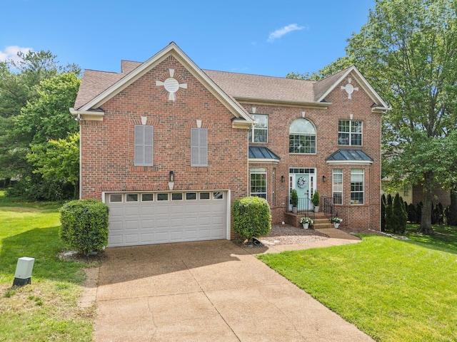 104 Drayton Ct, Franklin, TN 37067 - view of front of house with a front yard, brick siding, a shingled roof, an attached garage, and driveway