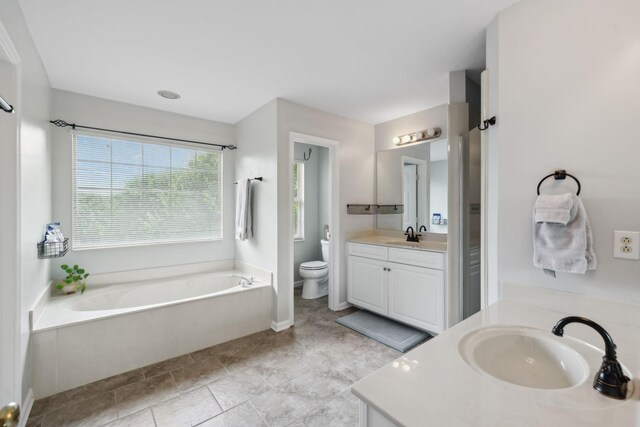 104 Drayton Ct, Franklin, TN 37067 - full bath featuring toilet, baseboards, a bath, and vanity