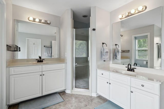 104 Drayton Ct, Franklin, TN 37067 - full bathroom with a sink, tile patterned floors, a shower stall, and two vanities