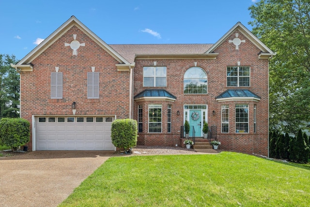 104 Drayton Ct, Franklin, TN 37067 - view of front facade with brick siding, a front lawn, and concrete driveway