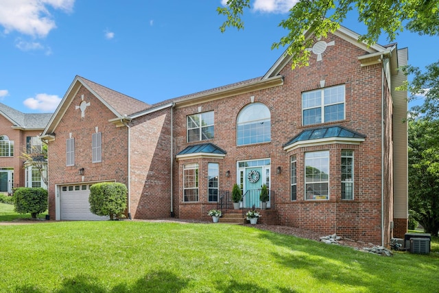 104 Drayton Ct, Franklin, TN 37067 - view of front of home featuring central air condition unit, an attached garage, a front lawn, and brick siding