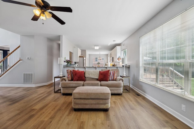 104 Drayton Ct, Franklin, TN 37067 - living room with visible vents, a wealth of natural light, and light wood-type flooring