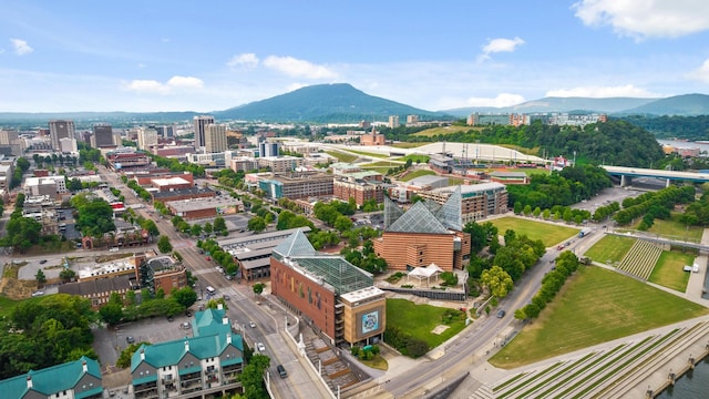 aerial view with a view of city and a mountain view