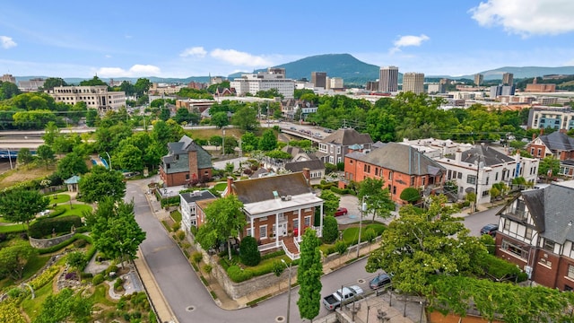 bird's eye view featuring a view of city and a mountain view