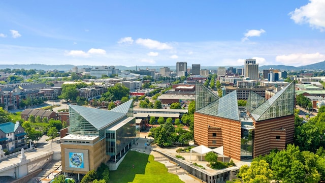bird's eye view featuring a city view and a mountain view