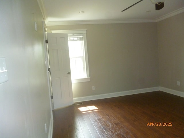 1314 Jewell Dr, Columbia, TN 38401 - spare room with crown molding, baseboards, ceiling fan, and wood-type flooring