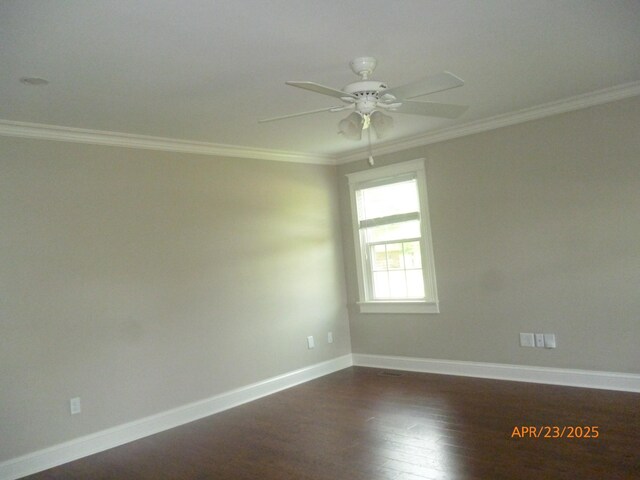 1314 Jewell Dr, Columbia, TN 38401 - empty room featuring crown molding, baseboards, a ceiling fan, and dark wood-type flooring