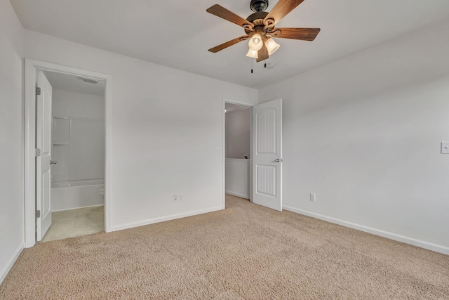 unfurnished bedroom featuring baseboards, ceiling fan, and light colored carpet