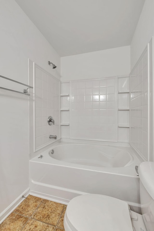 bathroom featuring baseboards, tile patterned flooring, toilet, and tub / shower combination