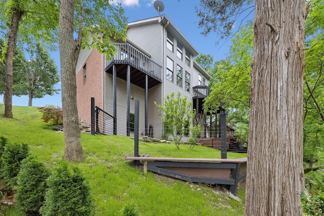 1111 Horseshoe Cv, Mount Juliet, TN 37122 - rear view of house featuring a lawn and a balcony
