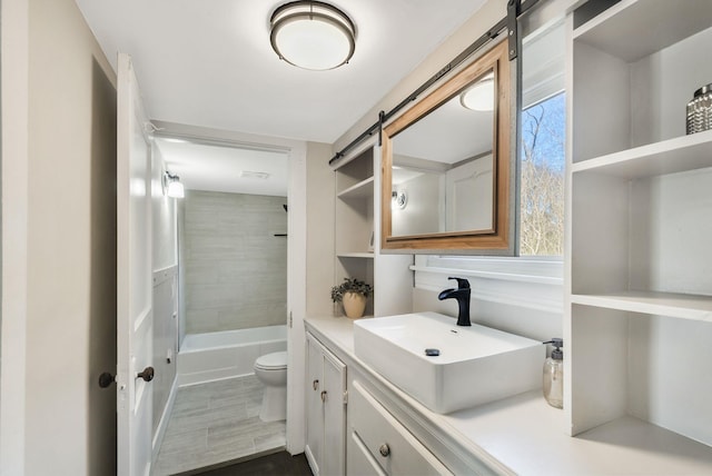 1614 Wade Rd, Lewisburg, TN 37091 - bathroom with toilet, vanity, and shower / washtub combination