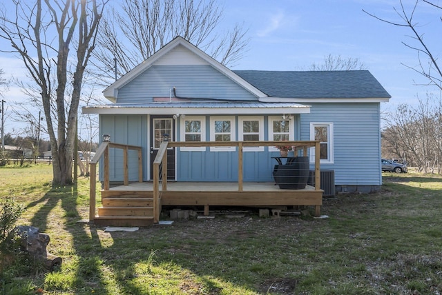 1614 Wade Rd, Lewisburg, TN 37091 - rear view of property featuring a wooden deck, a lawn, roof with shingles, and central AC