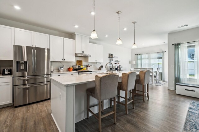 907 Caywood Rd, Smyrna, TN 37167 - kitchen with a sink, stainless steel appliances, dark wood-style floors, and visible vents