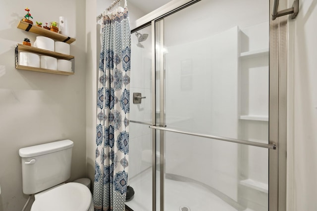907 Caywood Rd, Smyrna, TN 37167 - bathroom featuring a stall shower and toilet