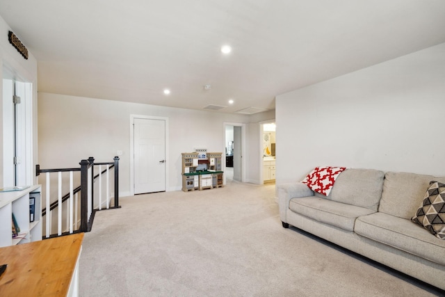 907 Caywood Rd, Smyrna, TN 37167 - living area featuring light colored carpet, visible vents, baseboards, and recessed lighting