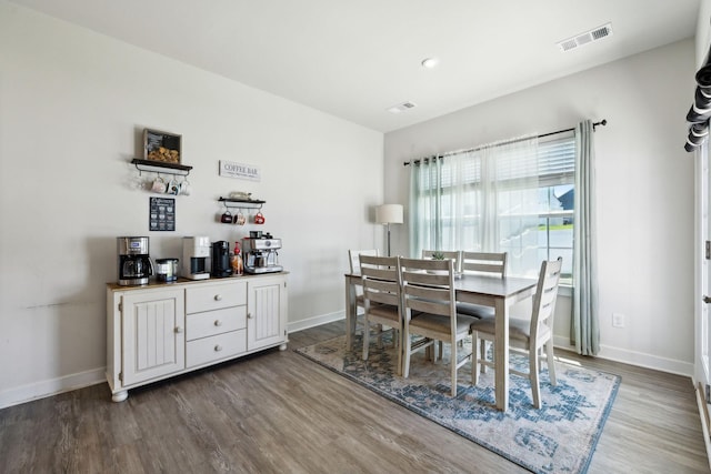 907 Caywood Rd, Smyrna, TN 37167 - dining area with baseboards, visible vents, and wood finished floors