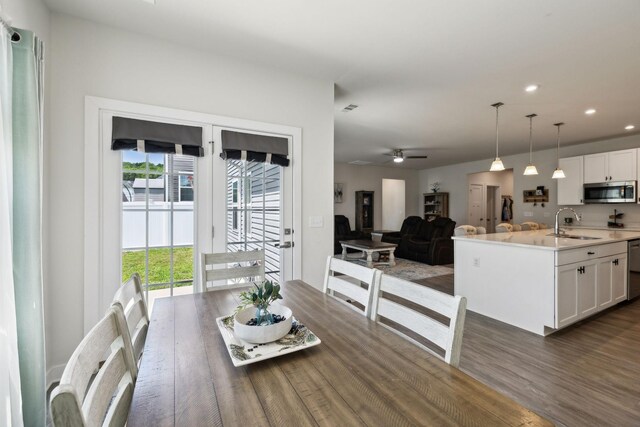 907 Caywood Rd, Smyrna, TN 37167 - dining area featuring dark wood finished floors, a healthy amount of sunlight, and recessed lighting