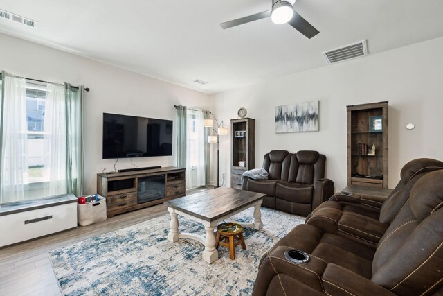 907 Caywood Rd, Smyrna, TN 37167 - living room featuring a ceiling fan, visible vents, and wood finished floors