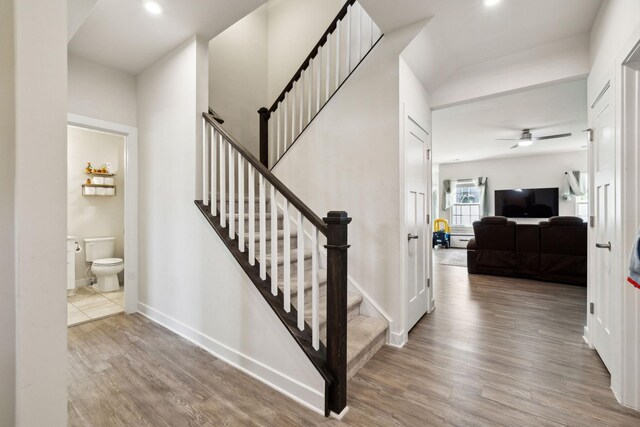 907 Caywood Rd, Smyrna, TN 37167 - stairway featuring baseboards, wood finished floors, a ceiling fan, and recessed lighting