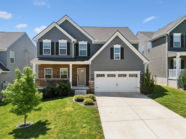 907 Caywood Rd, Smyrna, TN 37167 - craftsman inspired home featuring concrete driveway, a front yard, covered porch, and a garage