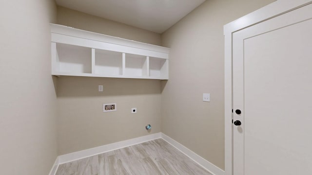 1150 Parsons Rd, Christiana, TN 37037 - laundry room with washer hookup, hookup for an electric dryer, laundry area, baseboards, and light wood-style floors