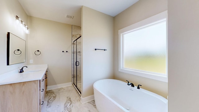 1150 Parsons Rd, Christiana, TN 37037 - full bath with vanity, marble finish floor, visible vents, a soaking tub, and a stall shower