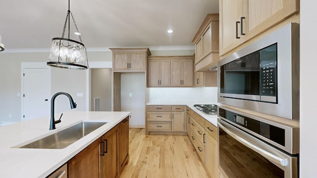 1150 Parsons Rd, Christiana, TN 37037 - kitchen featuring a sink, light brown cabinetry, stainless steel appliances, and light wood-type flooring
