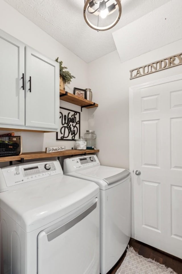 laundry room with cabinet space, separate washer and dryer, and dark wood-style floors