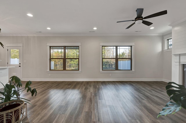 unfurnished living room with recessed lighting, baseboards, and dark wood-type flooring