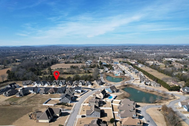 aerial view featuring a water view and a residential view