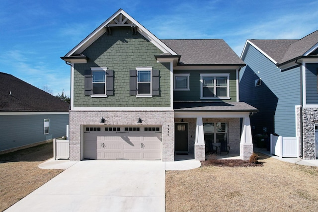 craftsman-style home with a garage, covered porch, concrete driveway, and brick siding