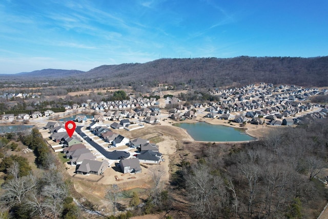 birds eye view of property featuring a residential view and a mountain view