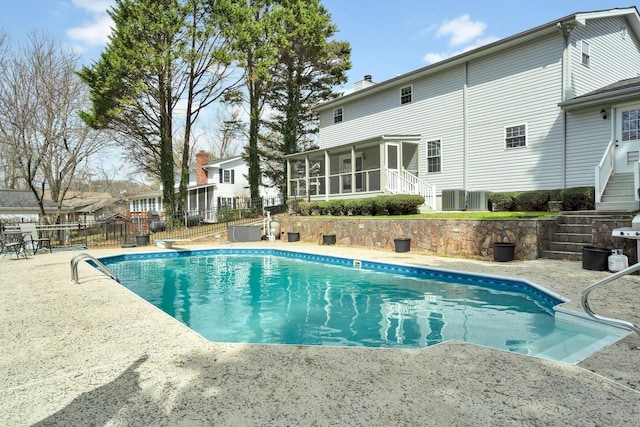 1922 W Brookhaven Cir, Dalton, GA 30720 - view of pool featuring fence, stairs, a sunroom, a fenced in pool, and a patio