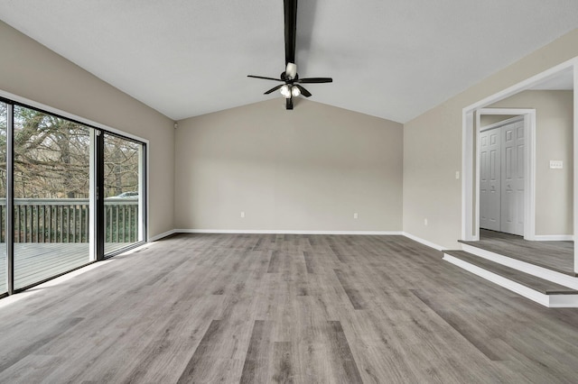 3839 Cleveland Hwy, Dalton, GA 30721 - unfurnished living room with a ceiling fan, wood finished floors, and baseboards