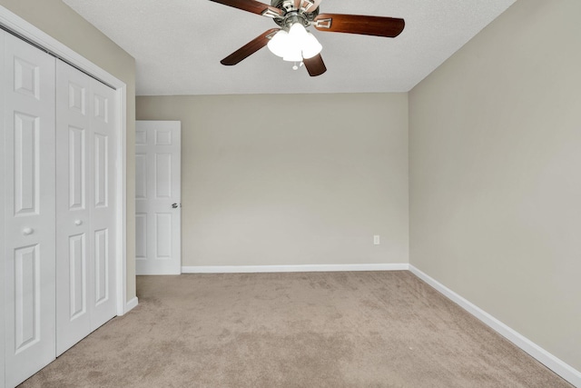 3839 Cleveland Hwy, Dalton, GA 30721 - unfurnished bedroom with carpet flooring, a closet, baseboards, and ceiling fan