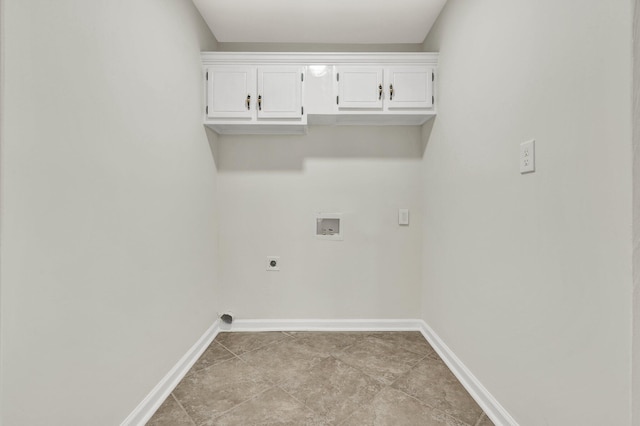 3839 Cleveland Hwy, Dalton, GA 30721 - laundry area featuring washer hookup, hookup for an electric dryer, baseboards, cabinet space, and light tile patterned flooring