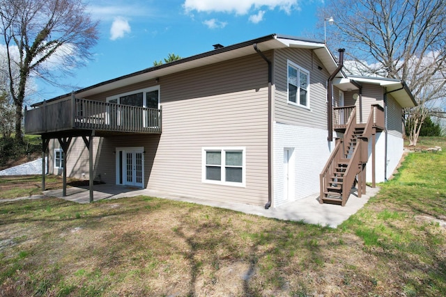3839 Cleveland Hwy, Dalton, GA 30721 - rear view of house featuring a patio, french doors, a lawn, a wooden deck, and stairway