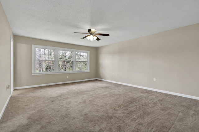 3839 Cleveland Hwy, Dalton, GA 30721 - carpeted spare room with a ceiling fan, a textured ceiling, and baseboards