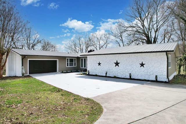 3839 Cleveland Hwy, Dalton, GA 30721 - view of front of house with metal roof, a garage, and driveway