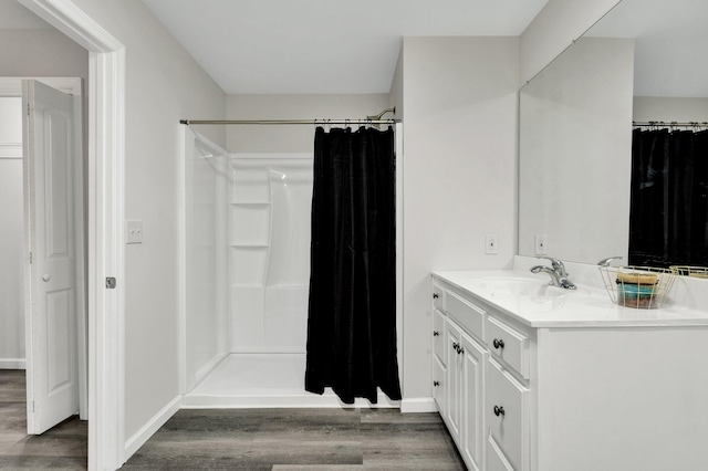 3839 Cleveland Hwy, Dalton, GA 30721 - full bathroom featuring wood finished floors, vanity, a shower with curtain, and baseboards