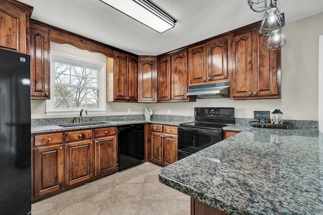 3839 Cleveland Hwy, Dalton, GA 30721 - kitchen featuring under cabinet range hood, black appliances, a sink, a textured ceiling, and dark stone counters