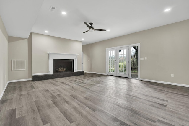3839 Cleveland Hwy, Dalton, GA 30721 - unfurnished living room featuring ceiling fan, baseboards, wood finished floors, and recessed lighting