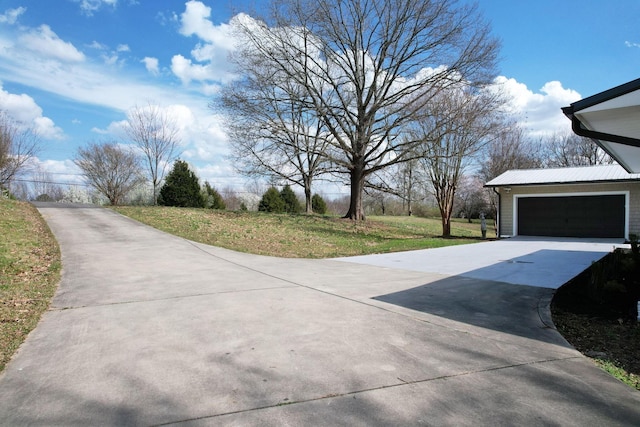 3839 Cleveland Hwy, Dalton, GA 30721 - view of side of property featuring concrete driveway, a yard, and metal roof