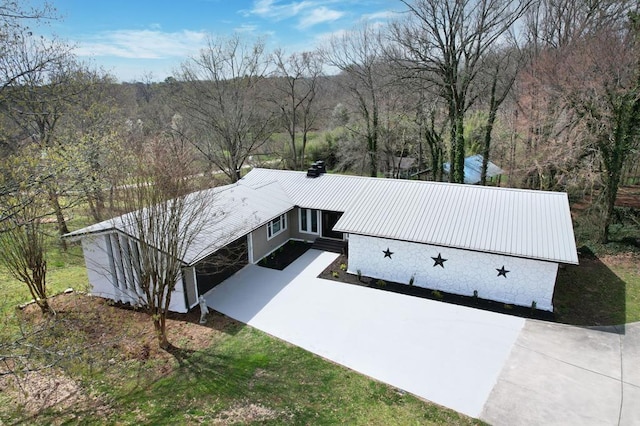 3839 Cleveland Hwy, Dalton, GA 30721 - aerial view of property and surrounding area featuring a heavily wooded area