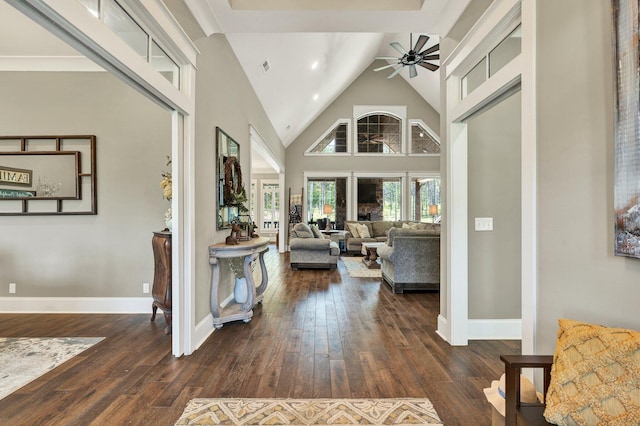 interior space featuring ceiling fan, baseboards, high vaulted ceiling, recessed lighting, and hardwood / wood-style floors