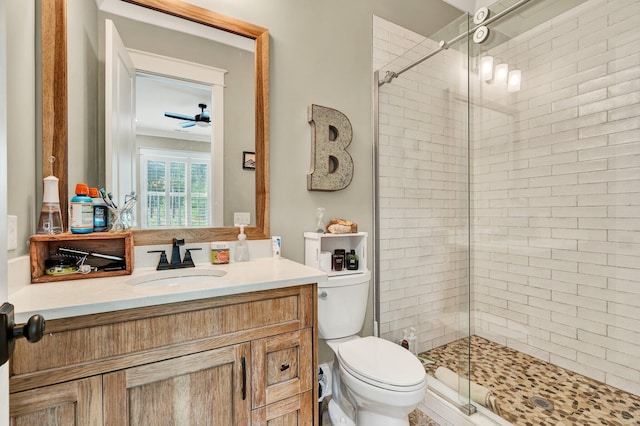 full bath featuring vanity, a stall shower, and toilet
