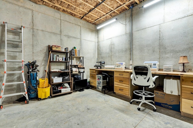 office featuring unfinished concrete floors